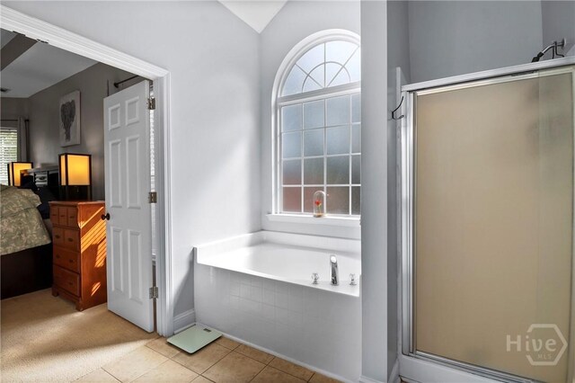 204 Bristol Way, Richmond Hill, GA 31324 - bathroom featuring a shower stall, a garden tub, and tile patterned floors