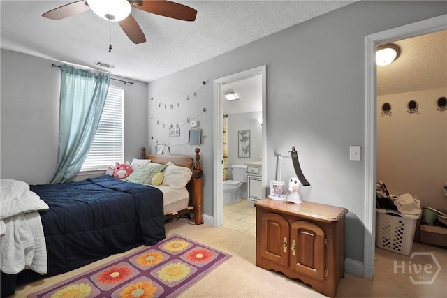 204 Bristol Way, Richmond Hill, GA 31324 - bedroom featuring a textured ceiling, ensuite bathroom, light carpet, and a ceiling fan