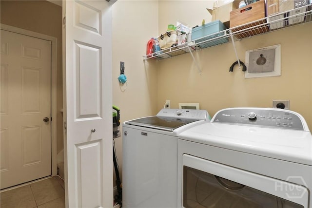204 Bristol Way, Richmond Hill, GA 31324 - washroom with washer and dryer and light tile patterned flooring