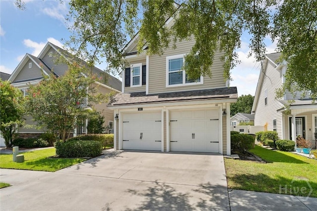 205 Summer Hill Ct, Richmond Hill, GA 31324 - traditional-style house featuring an attached garage, a front yard, and concrete driveway