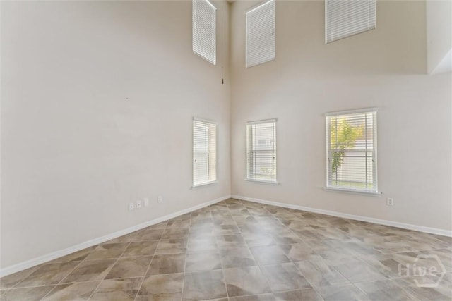 205 Summer Hill Ct, Richmond Hill, GA 31324 - empty room featuring a towering ceiling