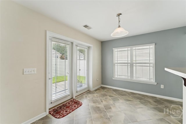 205 Summer Hill Ct, Richmond Hill, GA 31324 - unfurnished dining area featuring baseboards and light tile patterned flooring