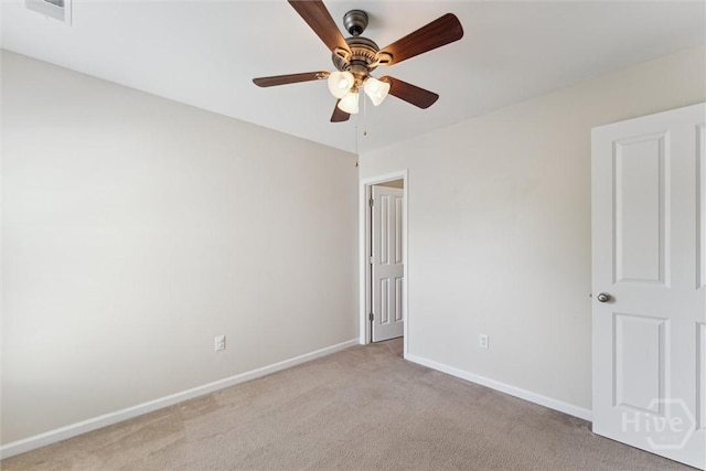 205 Summer Hill Ct, Richmond Hill, GA 31324 - unfurnished bedroom featuring light colored carpet and a ceiling fan