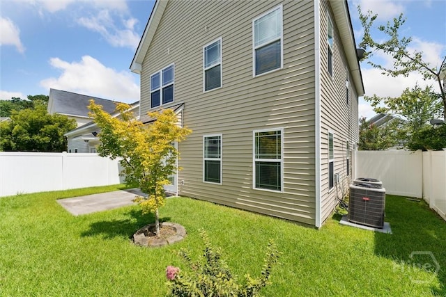 205 Summer Hill Ct, Richmond Hill, GA 31324 - back of property with a fenced backyard and a patio