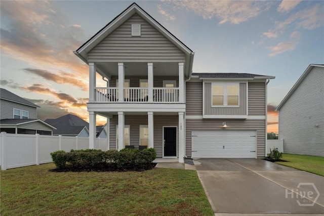 103 Williams Dr, Rincon, GA 31326 - view of front facade with a balcony, an attached garage, and driveway