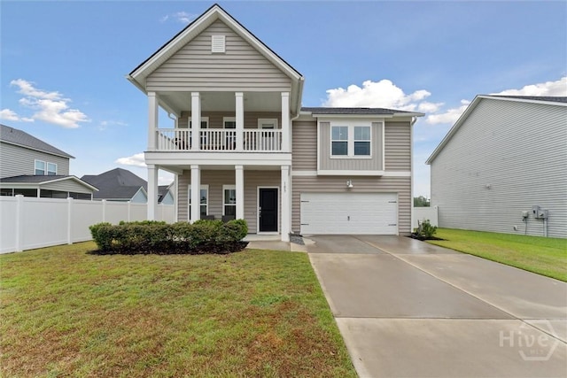 103 Williams Dr, Rincon, GA 31326 - view of front facade with a balcony, an attached garage, and driveway