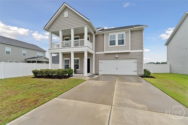 103 Williams Dr, Rincon, GA 31326 - view of front of home with a balcony, a garage, driveway, and a porch