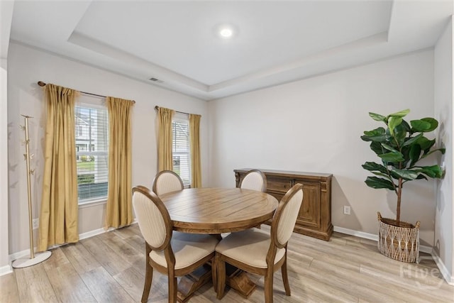 103 Williams Dr, Rincon, GA 31326 - dining area featuring a raised ceiling and light wood finished floors