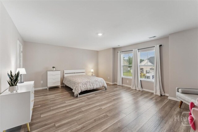 103 Williams Dr, Rincon, GA 31326 - bedroom featuring light wood-style flooring and baseboards