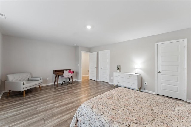 103 Williams Dr, Rincon, GA 31326 - bedroom with light wood-style flooring and recessed lighting