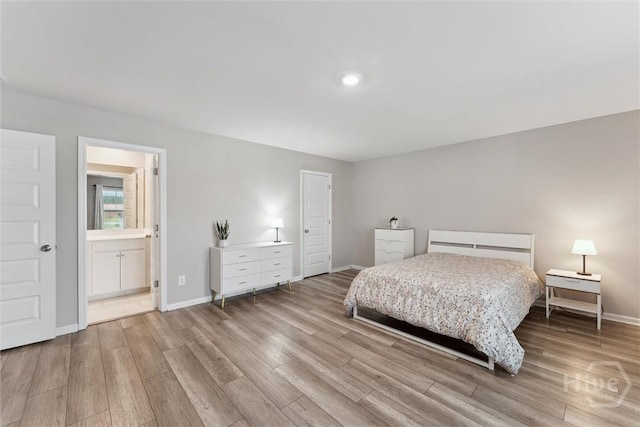 103 Williams Dr, Rincon, GA 31326 - bedroom featuring wood finished floors and ensuite bathroom
