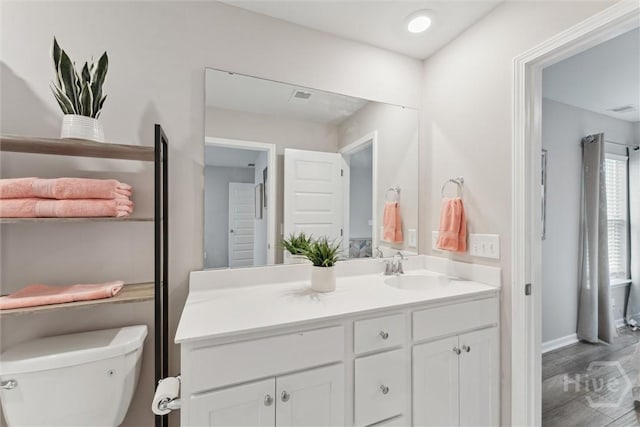 103 Williams Dr, Rincon, GA 31326 - bathroom featuring vanity and wood finished floors