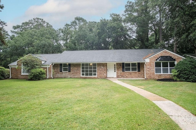12902 Canterbury Rd, Savannah, GA 31419 - ranch-style home featuring a front lawn, brick siding, and roof with shingles
