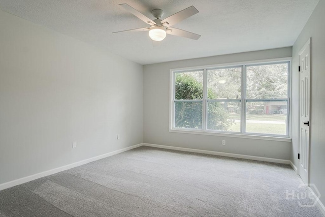 12902 Canterbury Rd, Savannah, GA 31419 - carpeted empty room with a ceiling fan and a textured ceiling