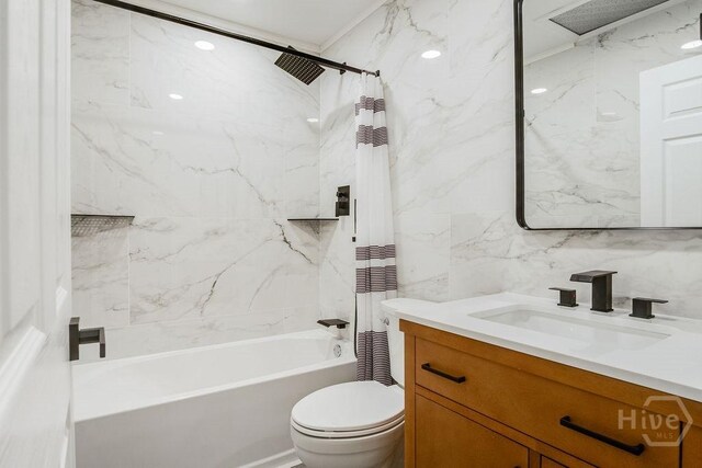 12902 Canterbury Rd, Savannah, GA 31419 - bathroom featuring vanity, shower / tub combo, and tile walls