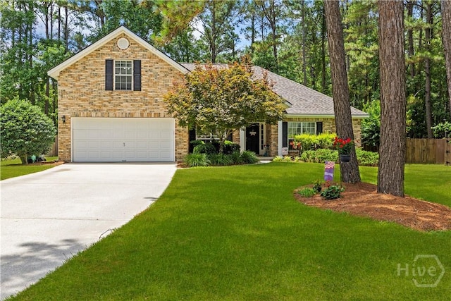 11 Rialto Ct, Pooler, GA 31322 - view of front facade featuring an attached garage, driveway, and brick siding