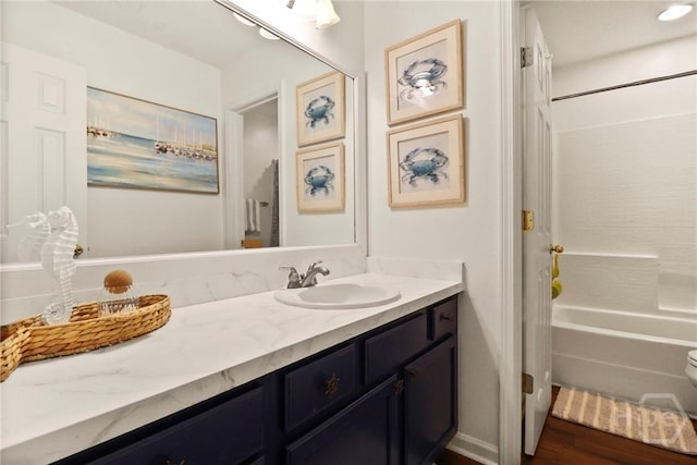 117 Barrington Rd, Pooler, GA 31322 - bathroom featuring vanity, shower / washtub combination, and wood finished floors