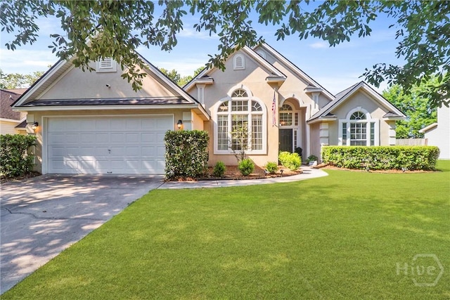 117 Barrington Rd, Pooler, GA 31322 - traditional home with concrete driveway, a front yard, stucco siding, and an attached garage