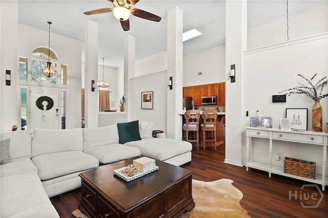 117 Barrington Rd, Pooler, GA 31322 - living room featuring a towering ceiling, dark wood-style flooring, and a ceiling fan