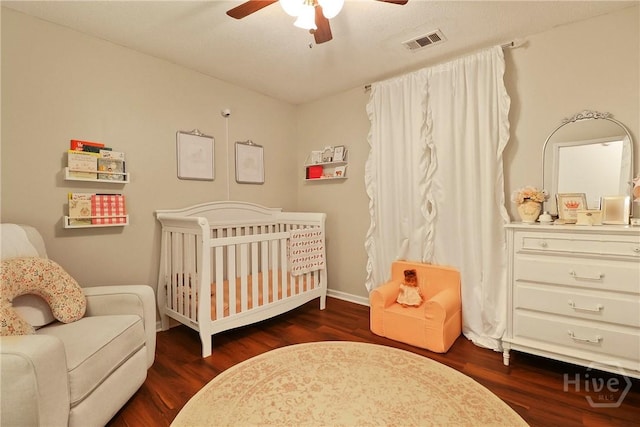 117 Barrington Rd, Pooler, GA 31322 - bedroom with a crib, wood finished floors, and a ceiling fan