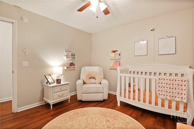 117 Barrington Rd, Pooler, GA 31322 - bedroom featuring wood finished floors, a crib, and a ceiling fan