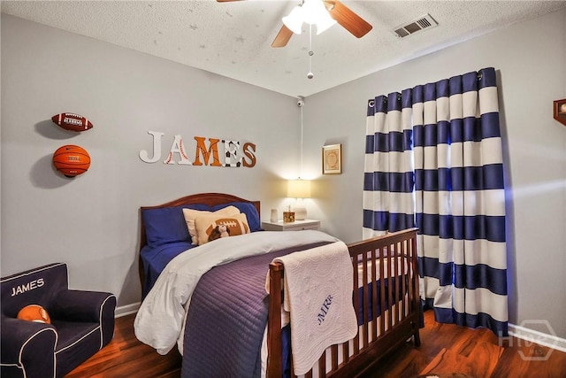 117 Barrington Rd, Pooler, GA 31322 - bedroom featuring wood finished floors, a ceiling fan, and a textured ceiling