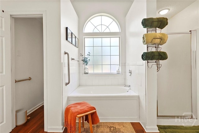 117 Barrington Rd, Pooler, GA 31322 - full bath with plenty of natural light, wood finished floors, a bath, and a stall shower