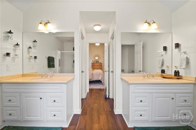 117 Barrington Rd, Pooler, GA 31322 - ensuite bathroom with a stall shower, two vanities, and wood finished floors