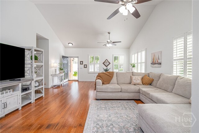 141 Regency Cir, Pooler, GA 31322 - living room featuring high vaulted ceiling, a ceiling fan, plenty of natural light, and light wood-style floors