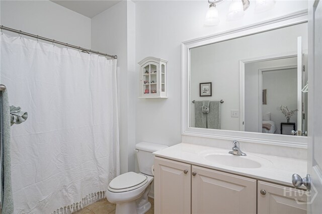 141 Regency Cir, Pooler, GA 31322 - ensuite bathroom featuring vanity, tile patterned flooring, and curtained shower