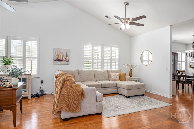 141 Regency Cir, Pooler, GA 31322 - living room with a ceiling fan, high vaulted ceiling, healthy amount of natural light, a chandelier, and light wood-style floors