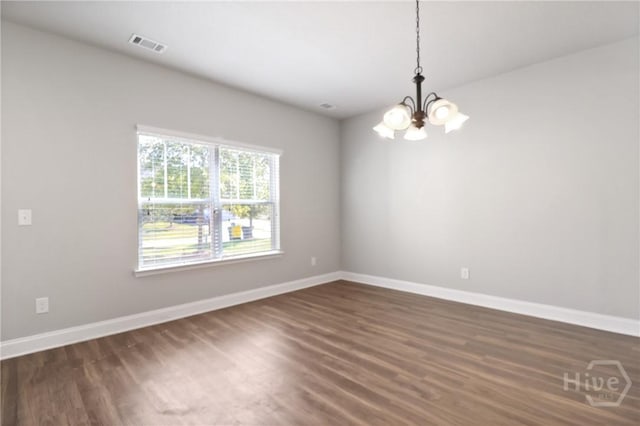 302 Morgan Pines Dr, Pooler, GA 31322 - unfurnished room featuring a chandelier and dark wood-style flooring