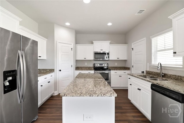 302 Morgan Pines Dr, Pooler, GA 31322 - kitchen featuring appliances with stainless steel finishes, dark wood-type flooring, white cabinetry, and recessed lighting
