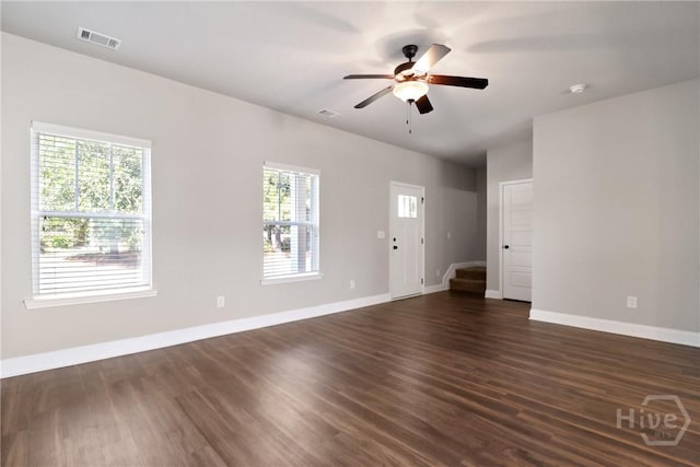 302 Morgan Pines Dr, Pooler, GA 31322 - unfurnished living room featuring a ceiling fan, dark wood-style flooring, and stairs