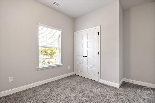 302 Morgan Pines Dr, Pooler, GA 31322 - unfurnished bedroom featuring carpet flooring and a closet