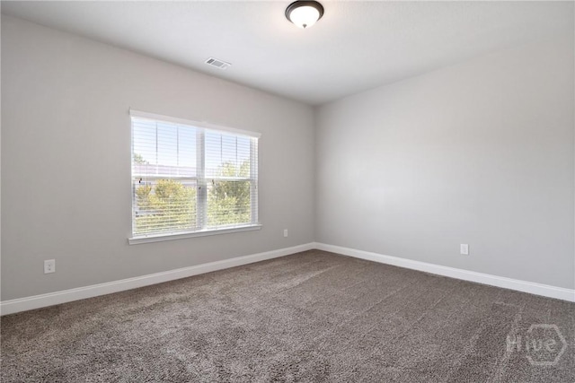 302 Morgan Pines Dr, Pooler, GA 31322 - spare room featuring dark carpet and baseboards