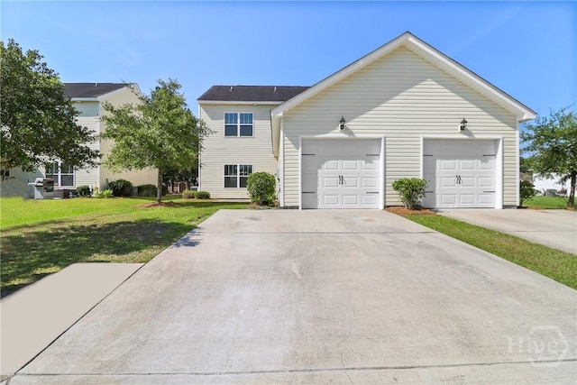 302 Morgan Pines Dr, Pooler, GA 31322 - view of front of house with a front yard, concrete driveway, and a garage
