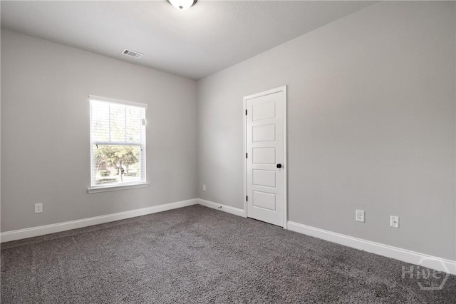 302 Morgan Pines Dr, Pooler, GA 31322 - unfurnished room with dark carpet and baseboards
