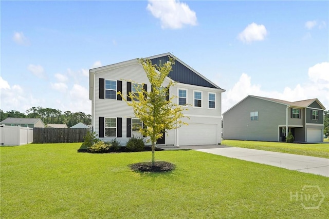 13 Summer Place Dr, Guyton, GA 31312 - view of front of property with driveway, an attached garage, and board and batten siding