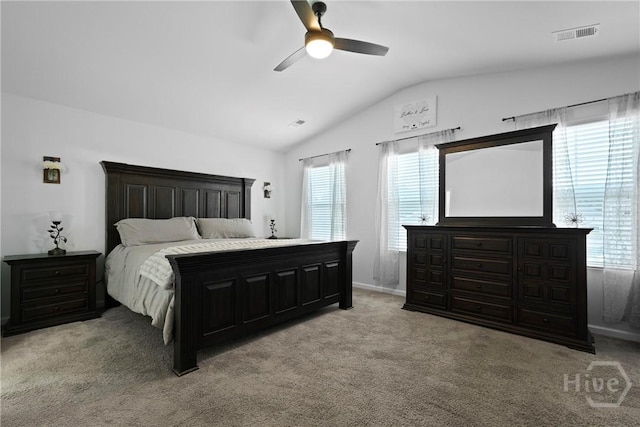 13 Summer Place Dr, Guyton, GA 31312 - bedroom featuring vaulted ceiling, multiple windows, light colored carpet, and ceiling fan