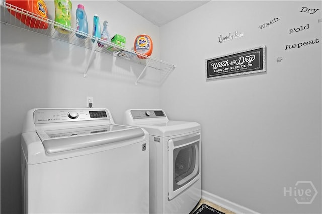 13 Summer Place Dr, Guyton, GA 31312 - washroom with washer and clothes dryer and baseboards