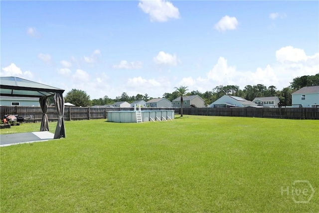 13 Summer Place Dr, Guyton, GA 31312 - fenced backyard featuring a gazebo