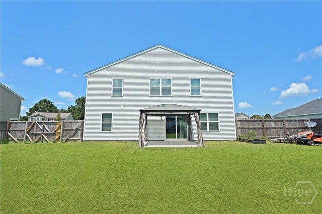 13 Summer Place Dr, Guyton, GA 31312 - back of house with a gazebo and a fenced backyard
