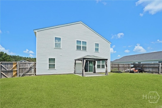 13 Summer Place Dr, Guyton, GA 31312 - back of property featuring a gazebo, a fenced backyard, and a patio