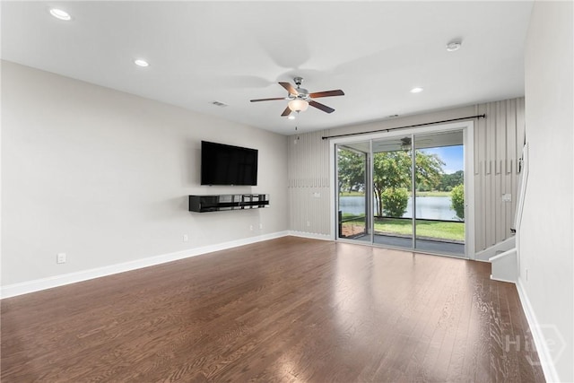 160 Lake Lily Dr, Richmond Hill, GA 31324 - unfurnished living room with ceiling fan, dark wood-style floors, and recessed lighting