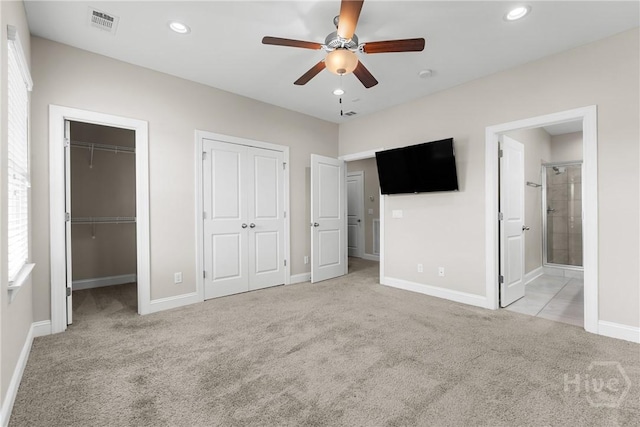 160 Lake Lily Dr, Richmond Hill, GA 31324 - unfurnished bedroom featuring carpet flooring, multiple closets, recessed lighting, connected bathroom, and ceiling fan