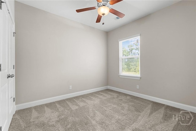 160 Lake Lily Dr, Richmond Hill, GA 31324 - empty room featuring light colored carpet and ceiling fan