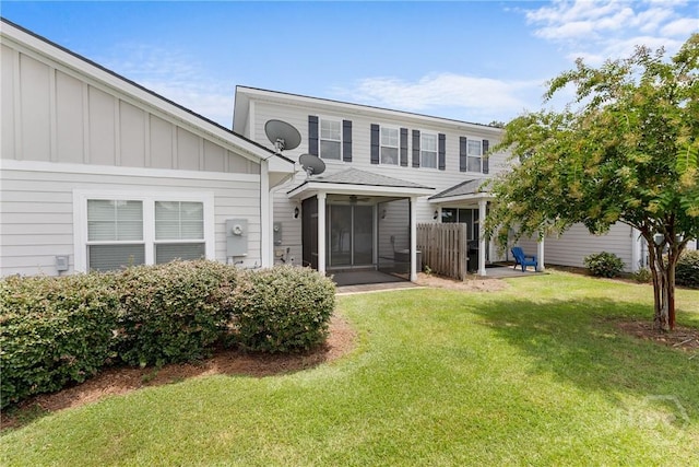 160 Lake Lily Dr, Richmond Hill, GA 31324 - view of front of property featuring board and batten siding and a front yard