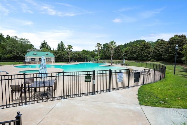 137 Regency Cir, Pooler, GA 31322 - community pool featuring a patio area and view of scattered trees