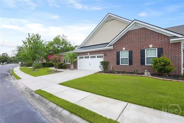 137 Regency Cir, Pooler, GA 31322 - view of front facade with brick siding, concrete driveway, an attached garage, and a front lawn